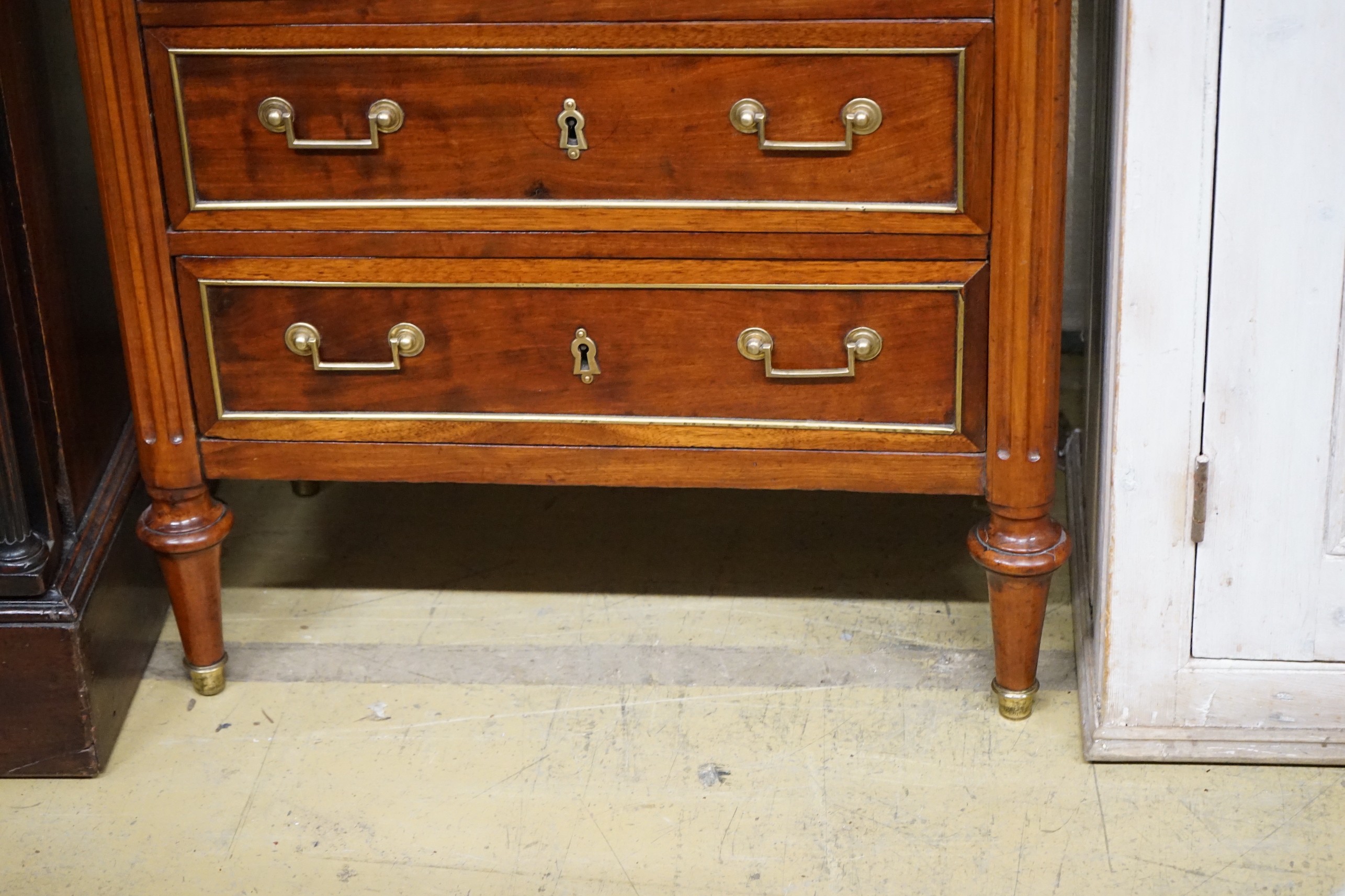 A late 19th/early 20th century French brass mounted mahogany marble top five drawer chest, width 66cm, depth 34cm, height 105cm